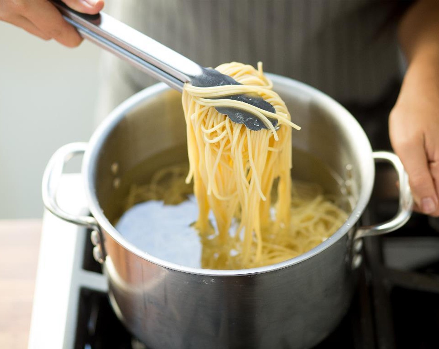 step 2 Bring a large saucepot with Water (8 cups) and Salt (1/2 Tbsp) to a boil over high heat. When the water boils, add the Spaghetti (8 oz). Stir the pasta occasionally to prevent sticking.