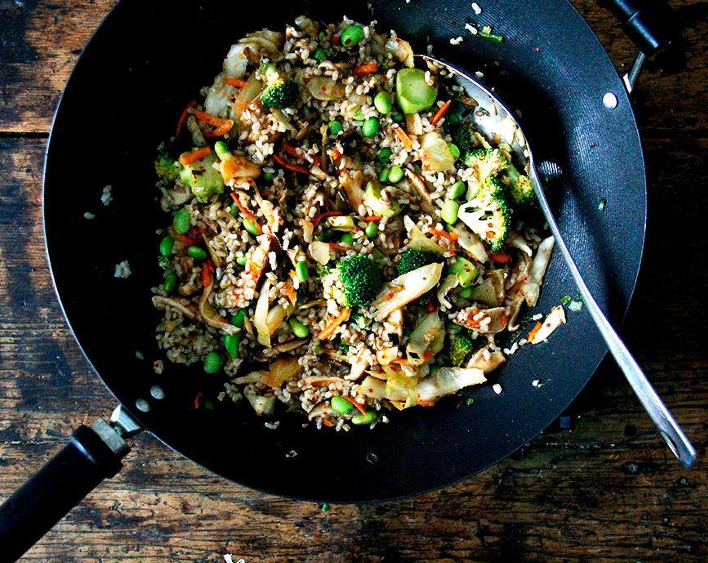 step 4 Stir in the cooked Brown Rice (1 cup), Frozen Shelled Edamame (1 cup), kimchi brine, Toasted Sesame Oil (1 tsp), and Rice Vinegar (1/2 Tbsp). Cook, stirring frequently, for about two to three minutes until heated through. Taste and adjust the seasonings if desired. Serve right away with any desired toppings.