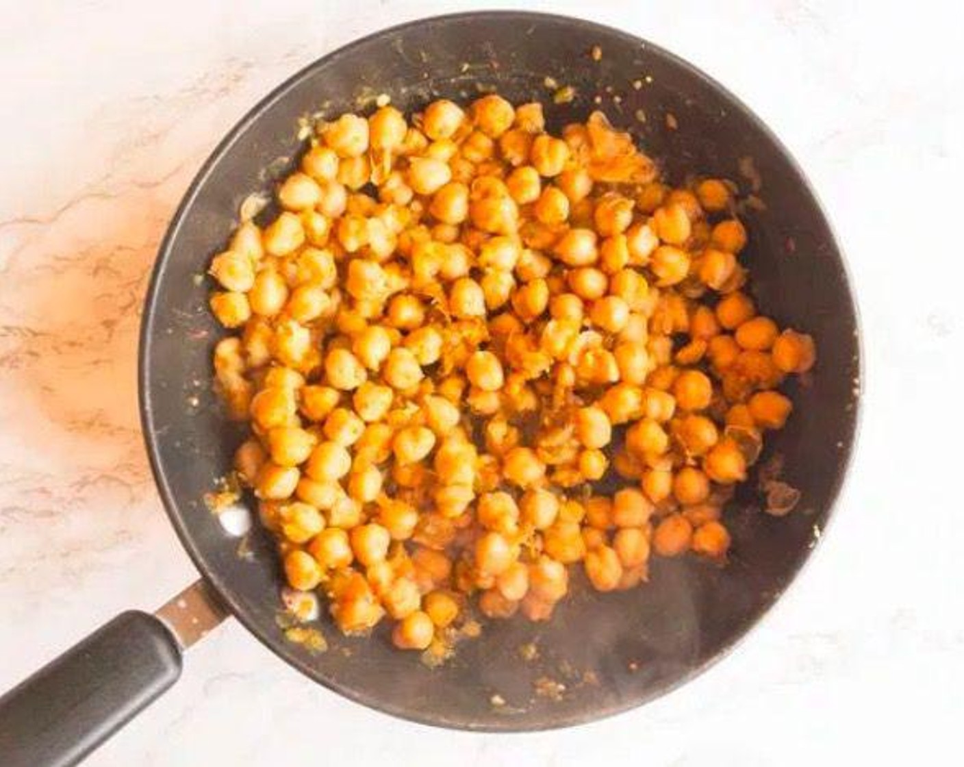 step 1 Spray wok or pan with oil and add Chickpeas (1 can), Salsa Verde (1/2 cup), and Chili Lime Seasoning Blend (1 Tbsp). Mix well and cook on medium-high for about 5 minutes, until a little crispy.