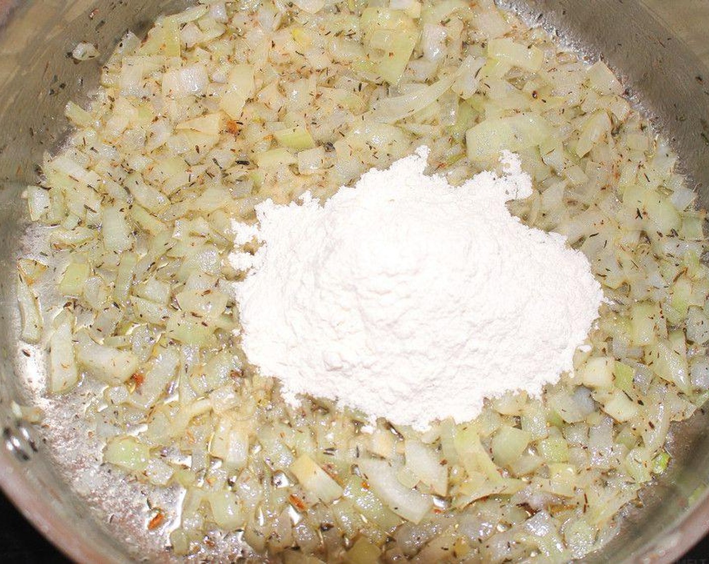 step 2 Add All-Purpose Flour (1/3 cup) and Dried Thyme (1 Tbsp), sauté until “blond”.