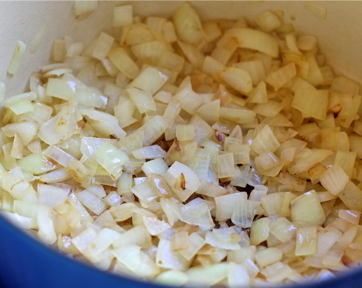 step 3 Add the chopped onion and cook until it turns translucent.