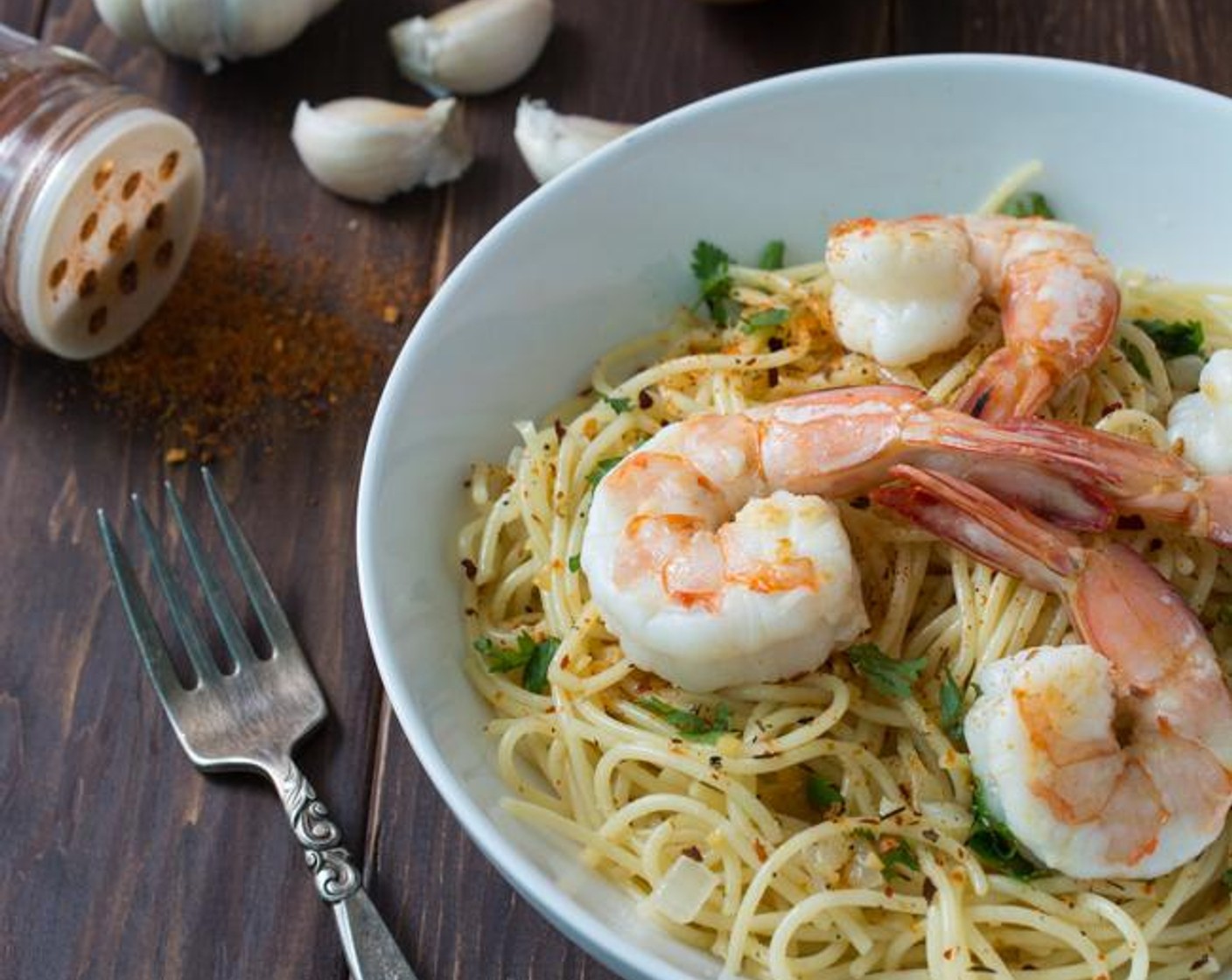 step 8 Transfer to serving plates. Top with more lime juice, Salt (to taste), Ground Black Pepper (to taste), and Crushed Red Pepper Flakes (to taste). Arrange the shrimp on the pasta.