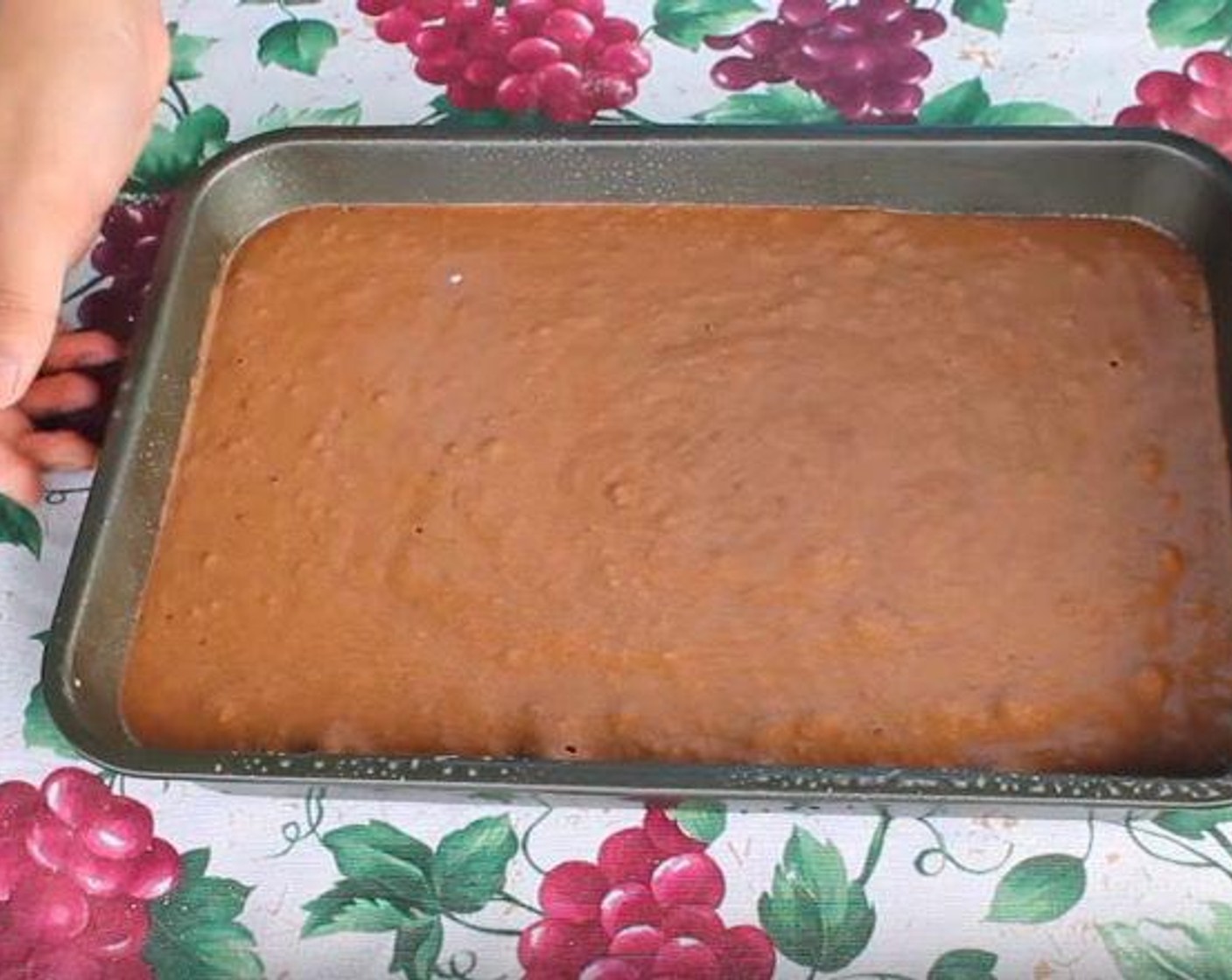 step 6 Transfer batter to a lightly greased 9 by 13-inch rectangular pan. Bake at 350 degrees F (180 degrees C) for 30-35 minutes.