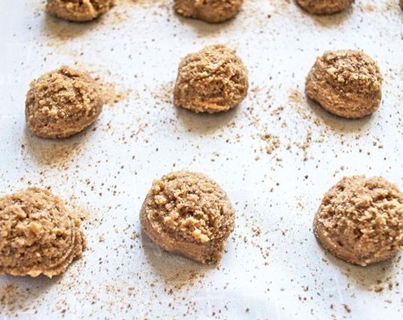 step 4 Use a small cookie scoop, approximately 1-inch, to scoop out cookies and place them on a parchment-lined baking sheet. Dust with Coconut Sugar (1 Tbsp) if desired then put in the freezer for 10-15 minutes. This step is really important; if you skip it the cookies will spread really flat when baking.