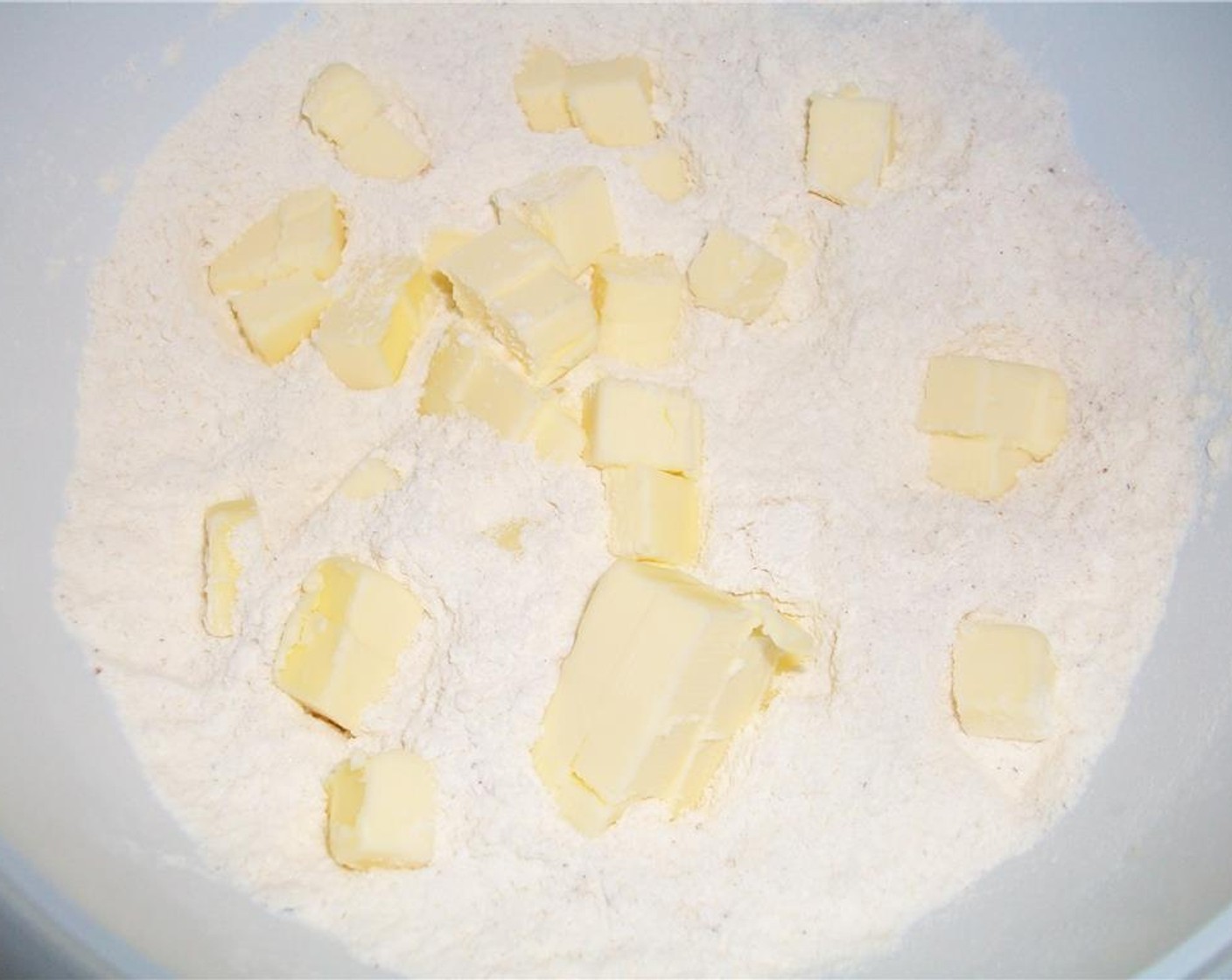step 3 Use a fork to blend in Unsalted Butter (4 Tbsp) until the mixture is crumbly.