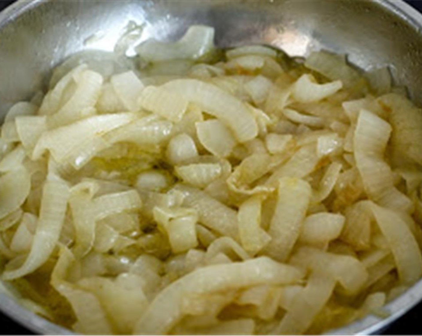 step 3 If you want to make the caramelised onion, heat the Olive Oil (1/3 cup) in a saucepan on medium high heat. Add in Yellow Onions (2) and leave for about 2 minutes.