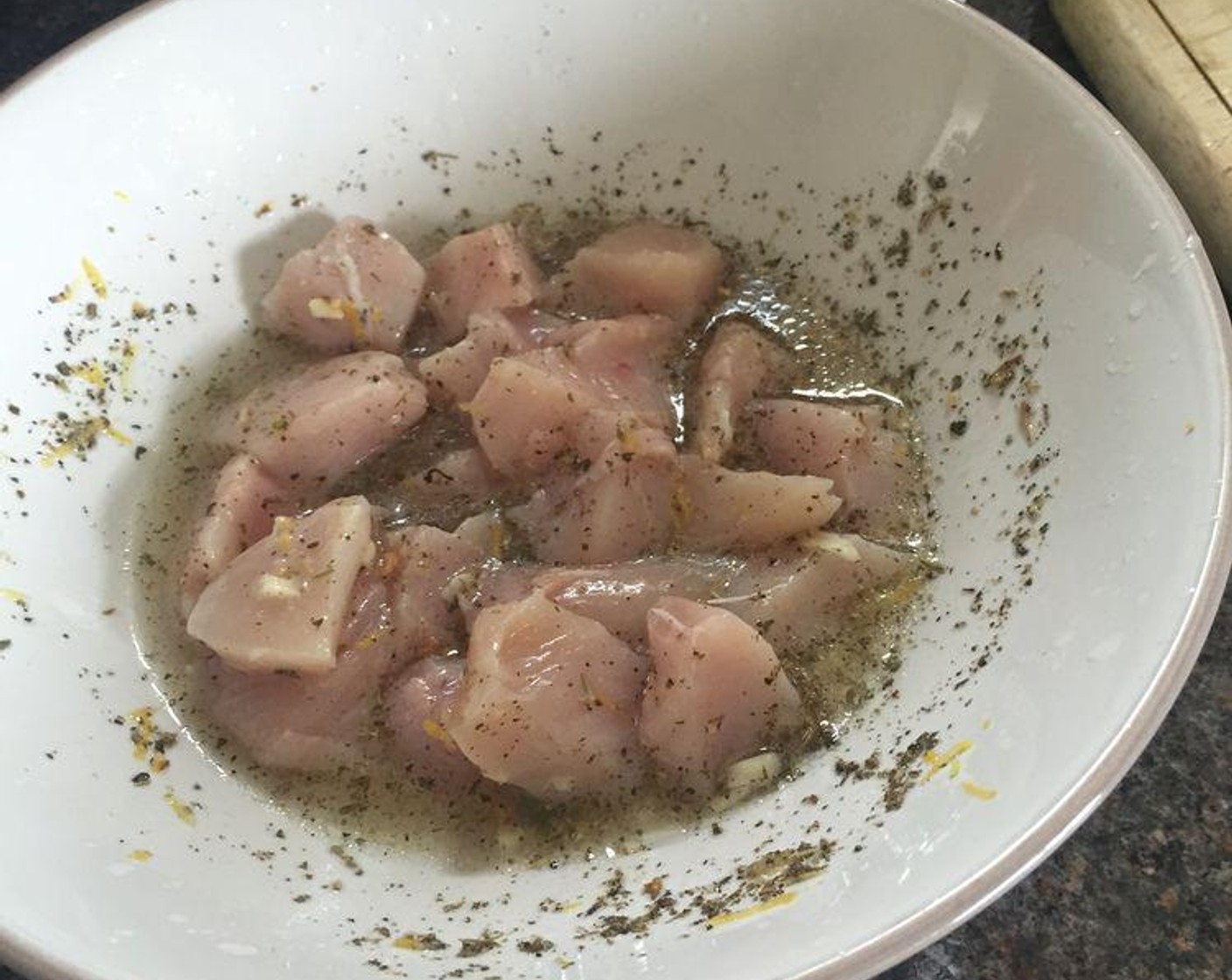 step 2 In a large bowl, mix lemon juice and zest, Olive Oil (1 tsp), Dried Oregano (1 tsp), Salt (1/2 tsp), and Dried Thyme (1/2 tsp). Place the Chicken Breast (1) in the bowl and marinate for 30 minutes or so.