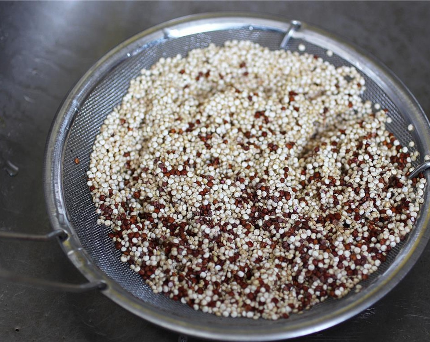 step 1 Preheat the oven to 350 degrees F (180 degrees C). Rinse and cook the Quinoa (1/2 cup).