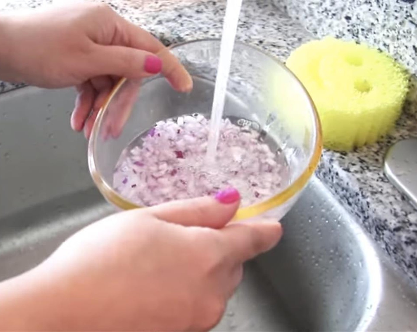 step 1 Add Onion (1/2)  to a bowl of hot water for 30 seconds, then drain. Add to a bowl of cold water for 30 seconds, then drain. This removes the spicy bite of the raw onion.