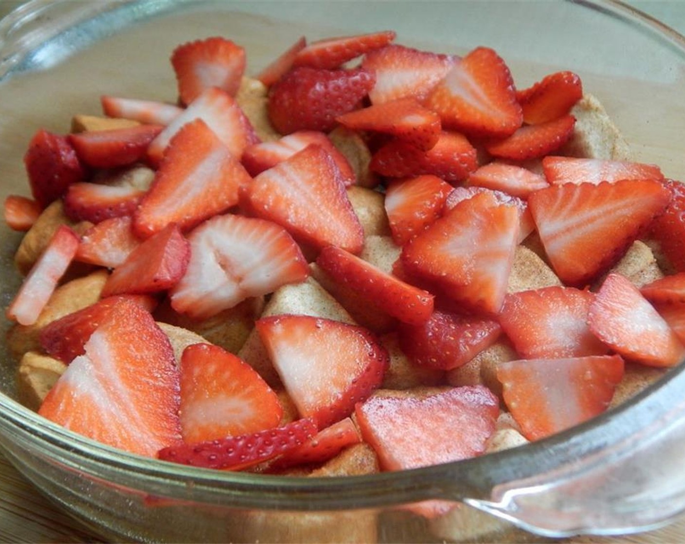 step 4 Layer biscuit dough on the bottom of your pie dish. Place Fresh Strawberry (1 cup) on top.