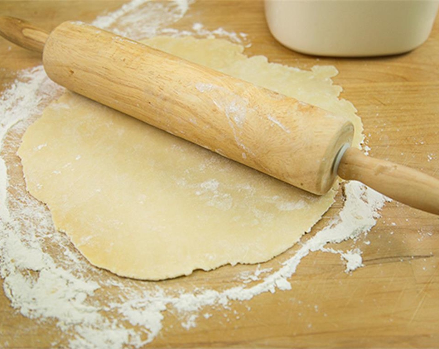 step 4 Take half and roll out to fit a 9-inch pie pan. Crimp the edges and pierce the dough with a fork. Chill for 15 minutes.