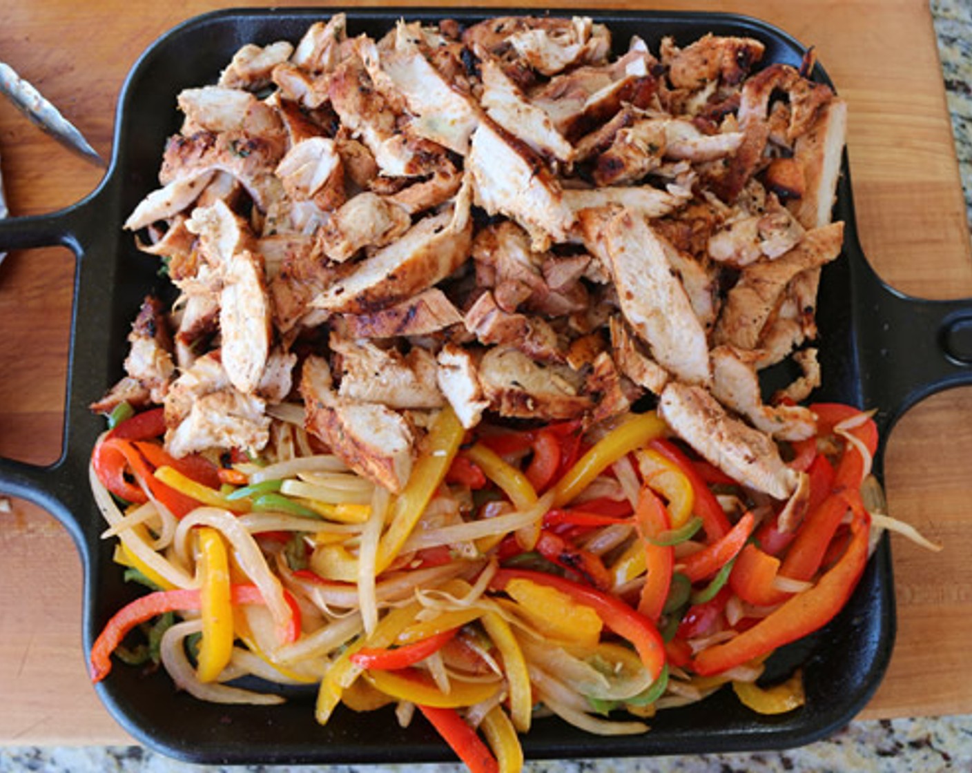 step 11 Slice chicken into thin strips. When vegetables are tender move them to one side of the skillet and add chicken.