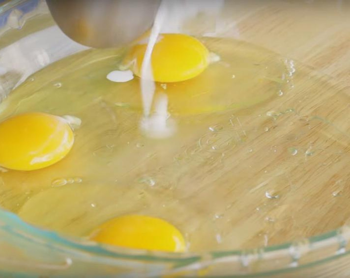 step 2 In a shallow bowl, crack Eggs (3) add Half and Half (1 cup), Vanilla Extract (1/2 tsp), Ground Cinnamon (1 tsp), Brown Sugar (2 Tbsp) and whisk until everything is well combined. In a large, heavy-bottomed skillet melt the Butter (1 Tbsp) over medium heat.