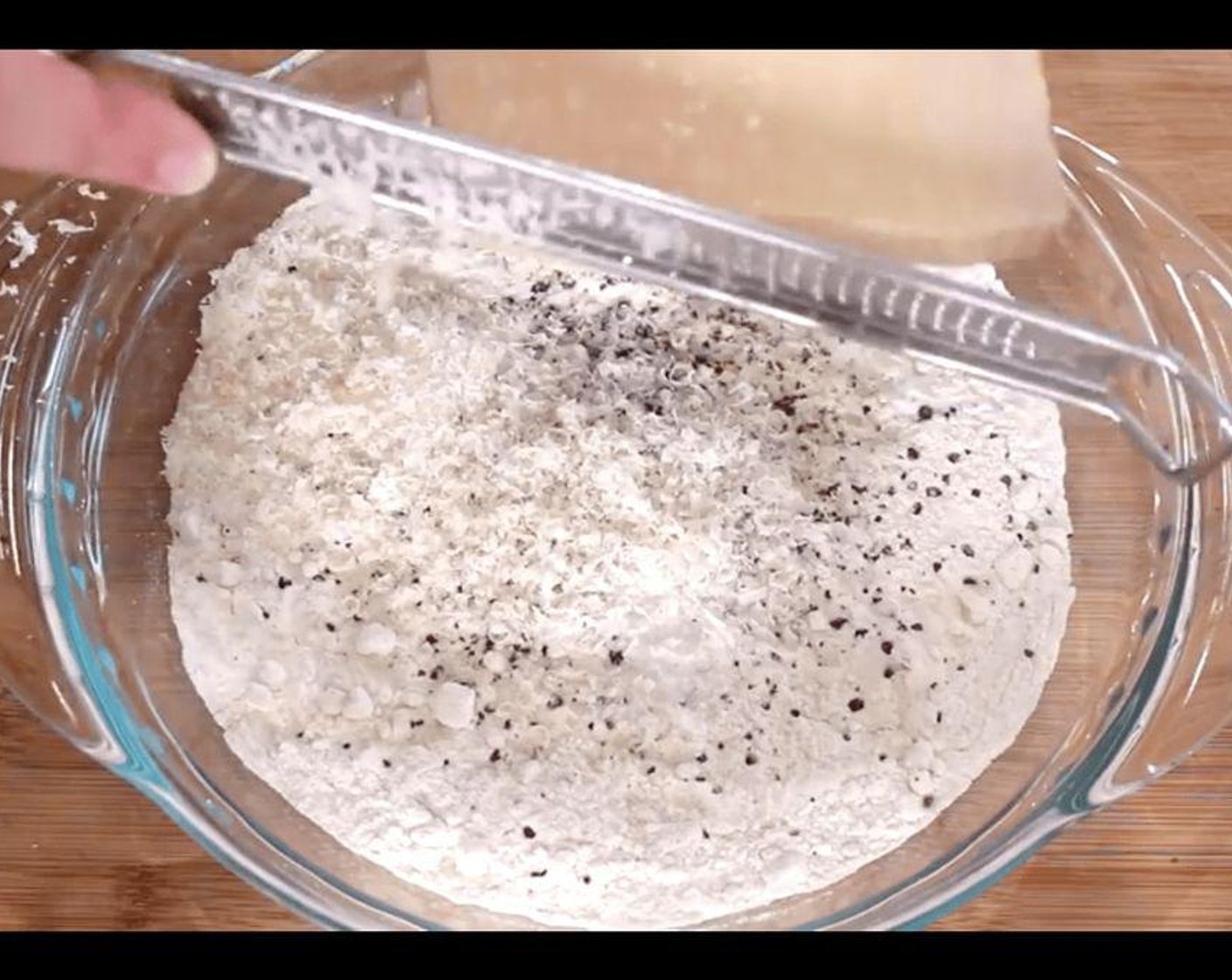 step 1 Mix together All-Purpose Flour (1/2 cup), Parmesan Cheese (3/4 cup), and Ground Black Pepper (1 tsp).