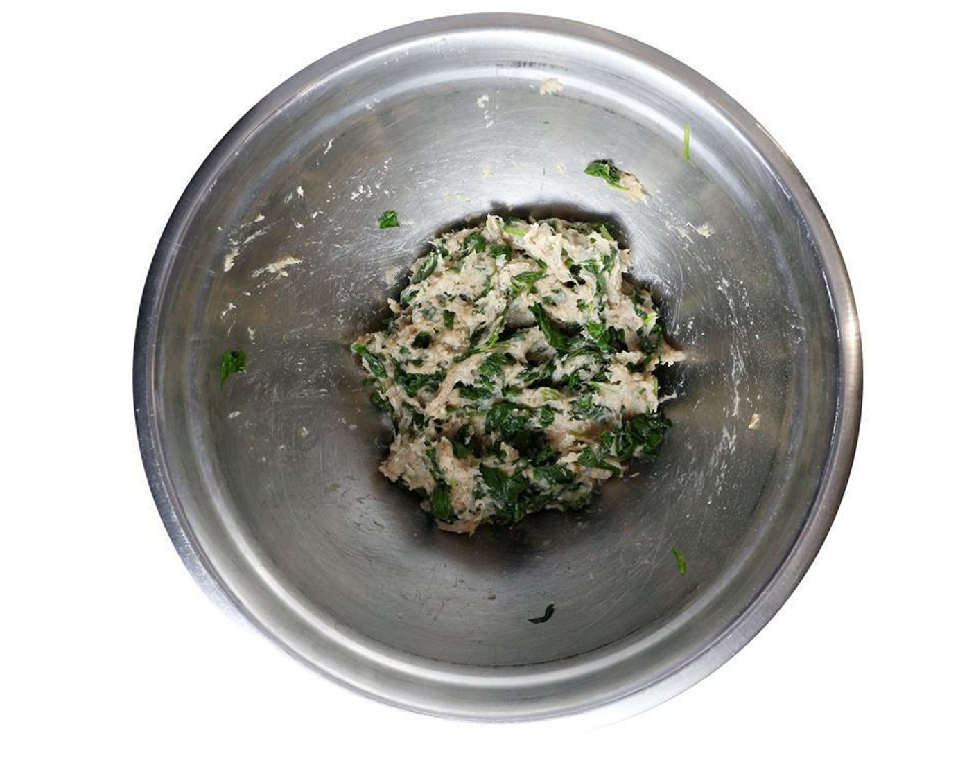 step 5 In a bowl, combine Ground Turkey (12 oz) with sliced scallions, Feta Cheese (1/3 cup) and chopped spinach. Season with a large pinch of salt and a pinch of pepper. Mix with your hands.