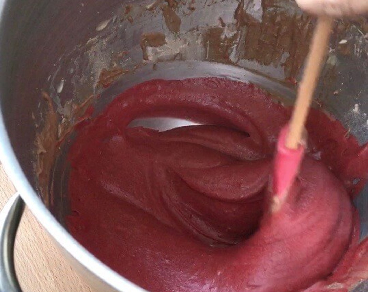 step 7 Remove the bowl from the mixer and add Red Food Coloring (1 1/2 Tbsp) until you get your desired colour.