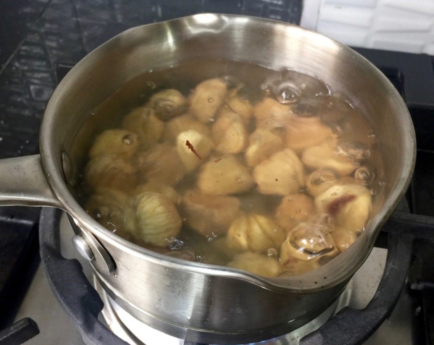 step 12 Then boil the dried chestnuts for about 20 minutes or until softened.