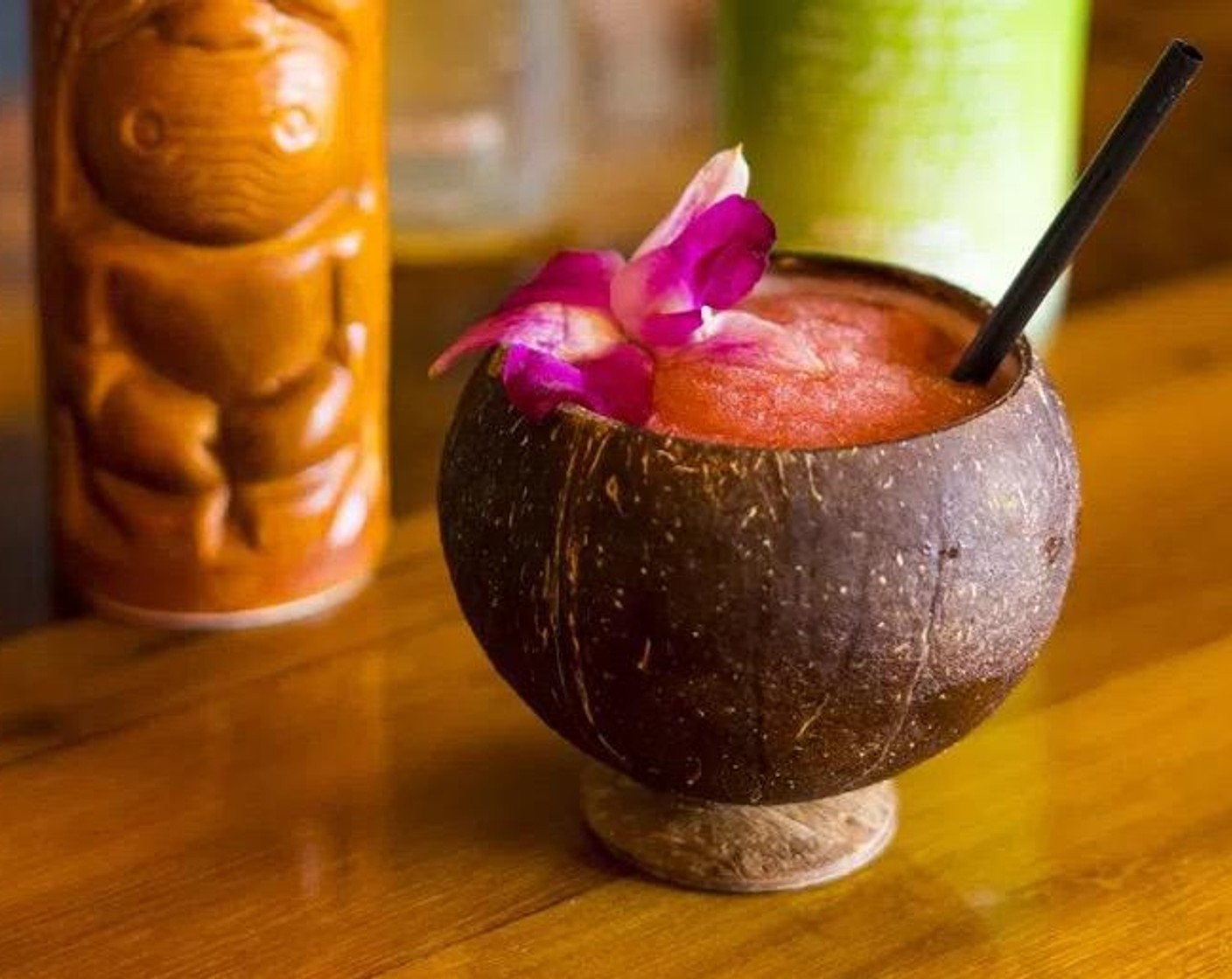 step 2 Serve in a coconut shell cup and garnish with an Edible Orchid (1). Serve and enjoy!