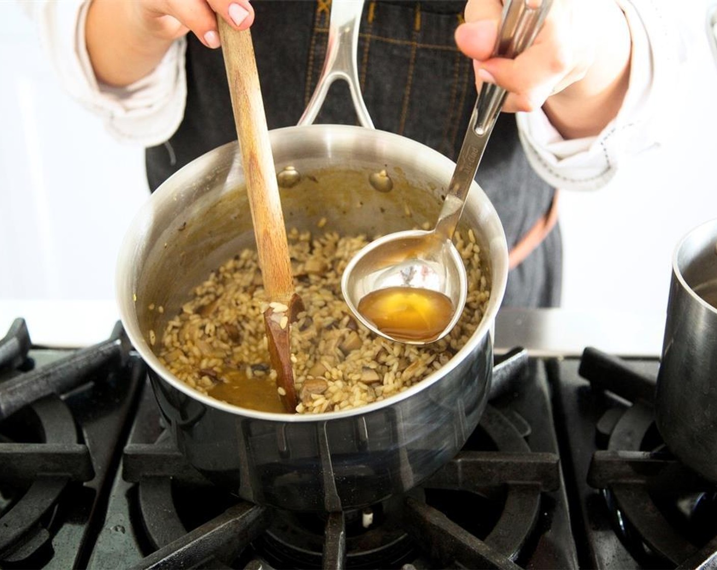 step 9 Add mushrooms, lemon juice, zest, and Arborio Rice (1 cup). Stir and cook for 3 minutes. Then deglaze with Port Wine (2 Tbsp).