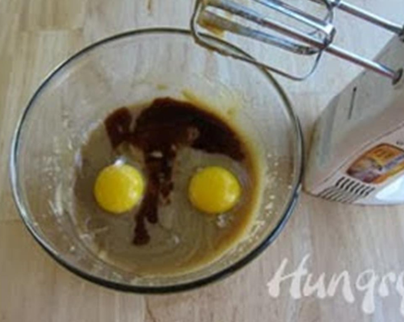 step 3 Add the Farmhouse Eggs® Large Brown Egg (1), Egg Yolk, and Vanilla Extract (1/2 Tbsp) and beat until fully incorporated.