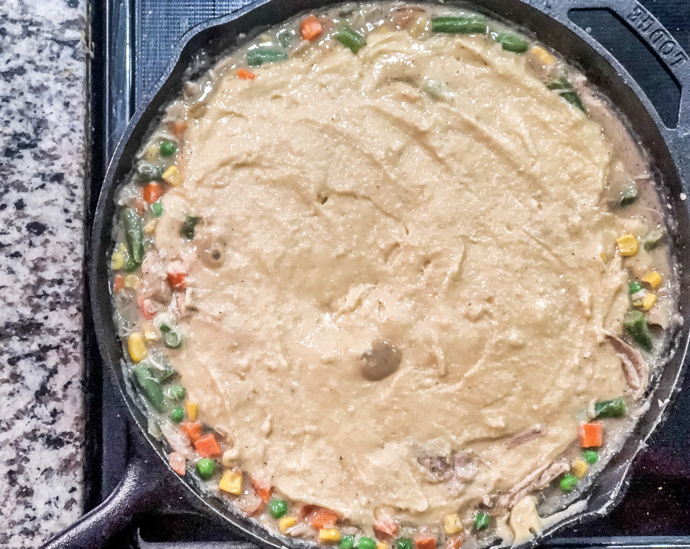 step 8 Pour evenly over chicken and bake in the oven for 20-25 minutes, until cornbread is golden brown.