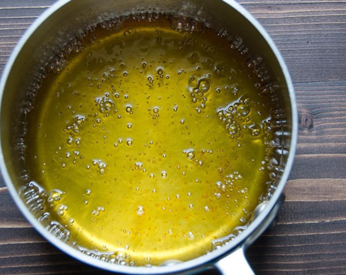 step 4 In a small heavy saucepan, combine the Honey (1/3 cup), Granulated Sugar (1/2 cup) and Water (1/4 cup). Heat over low heat, stirring constantly until the sugar is dissolved. Bring the mixture to a boil and cook for an additional 2 minutes.