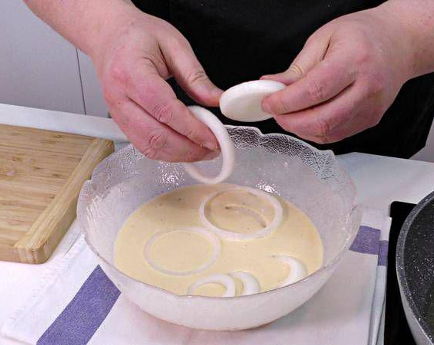 step 4 Take the mixture out of the fridge and dip the onion rings in the batter.