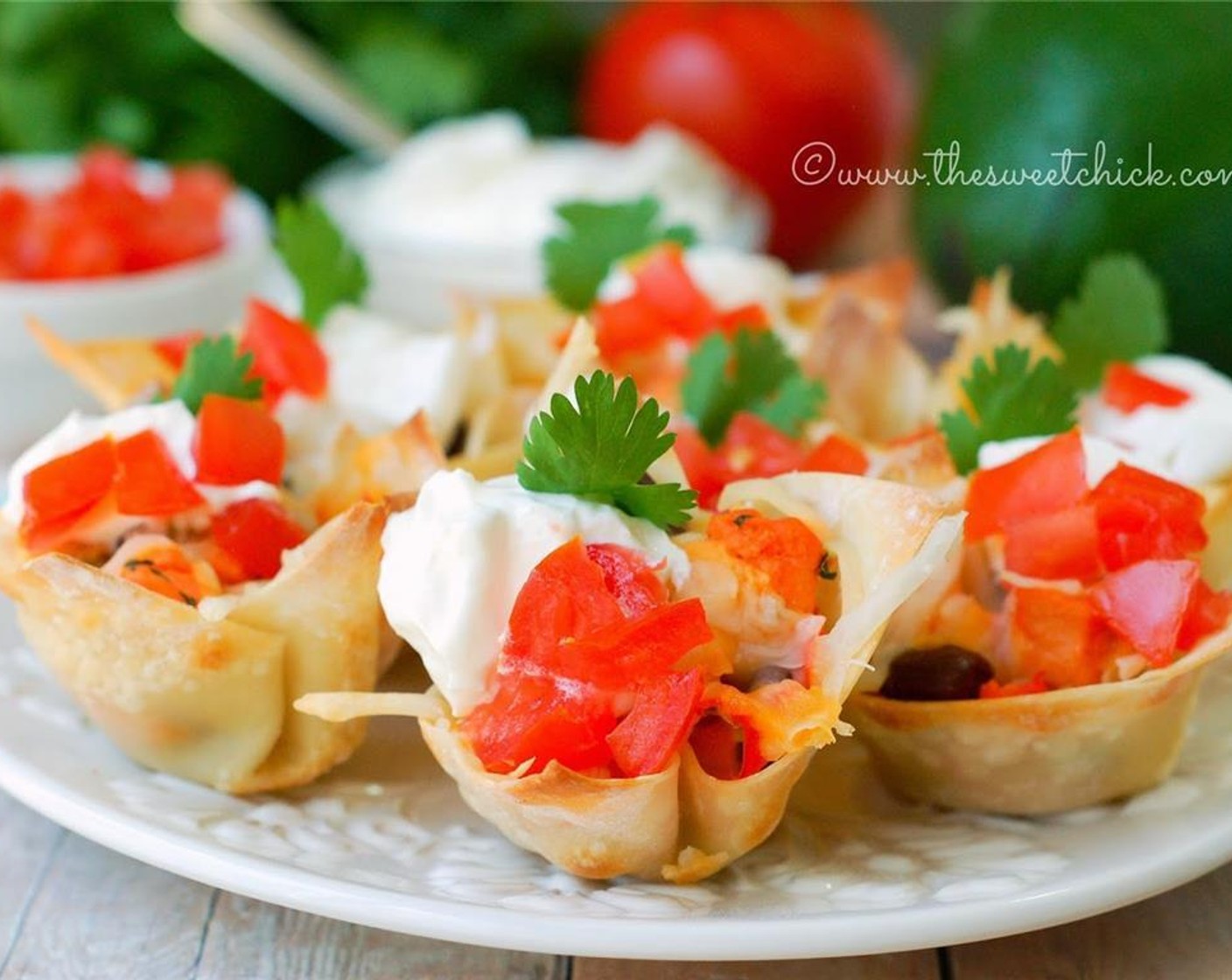 step 8 Remove from oven and allow to cool slightly before carefully removing from the wonton cups from the muffin tin. Serve warm with desired toppings.