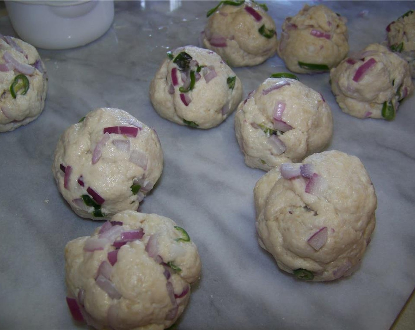 step 4 Shape the dough into balls, then flatten the dough ball with your hands into a thick disc.