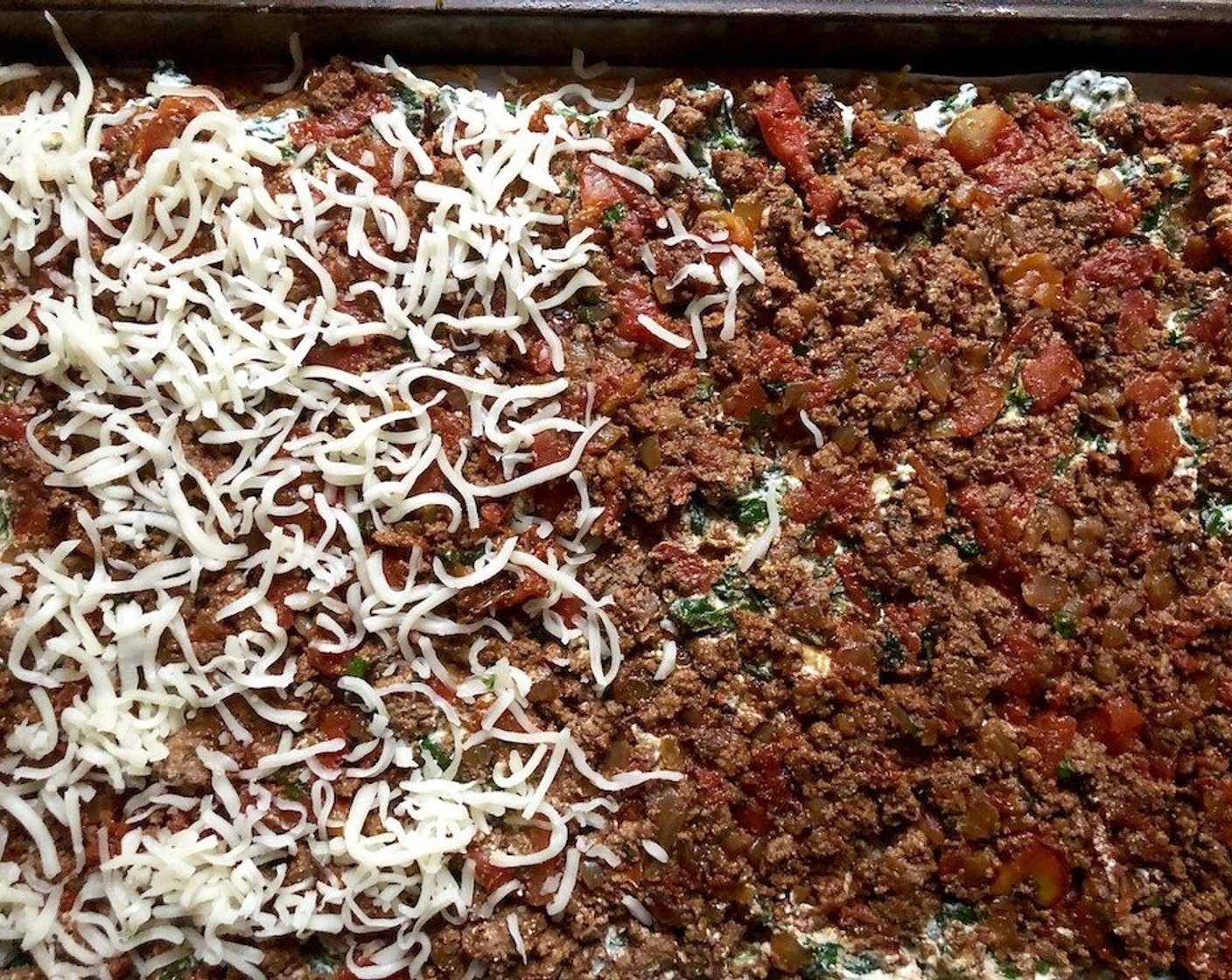 step 9 Evenly spread the spinach mixture over the cooked potato sheet. Then evenly spread the beef mixture over the spinach. Sprinkle Shredded Mozzarella Cheese (1 cup) over the beef.