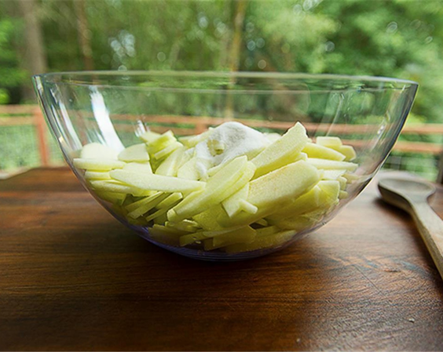 step 2 Preheat oven to 350 degrees F (180 degrees C). In a large bowl, toss the apples with the juice from Lemon (1) and Granulated Sugar (1/2 cup).