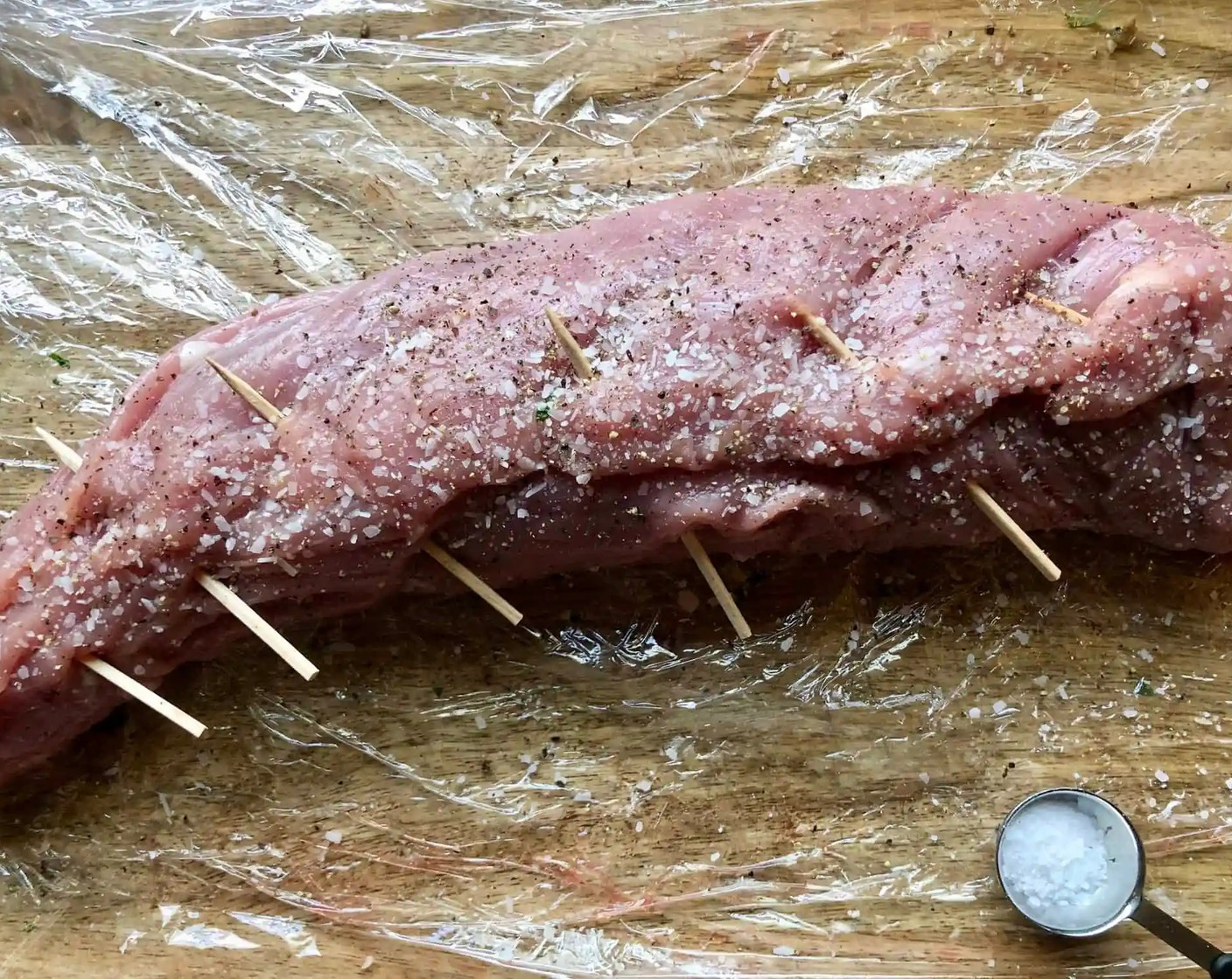 step 10 Place them diagonally in a row, keeping in mind that you need a flat surface for searing the meat in the skillet. Season all over with the remaining Salt (1 tsp) and Freshly Ground Black Pepper (1/4 tsp).