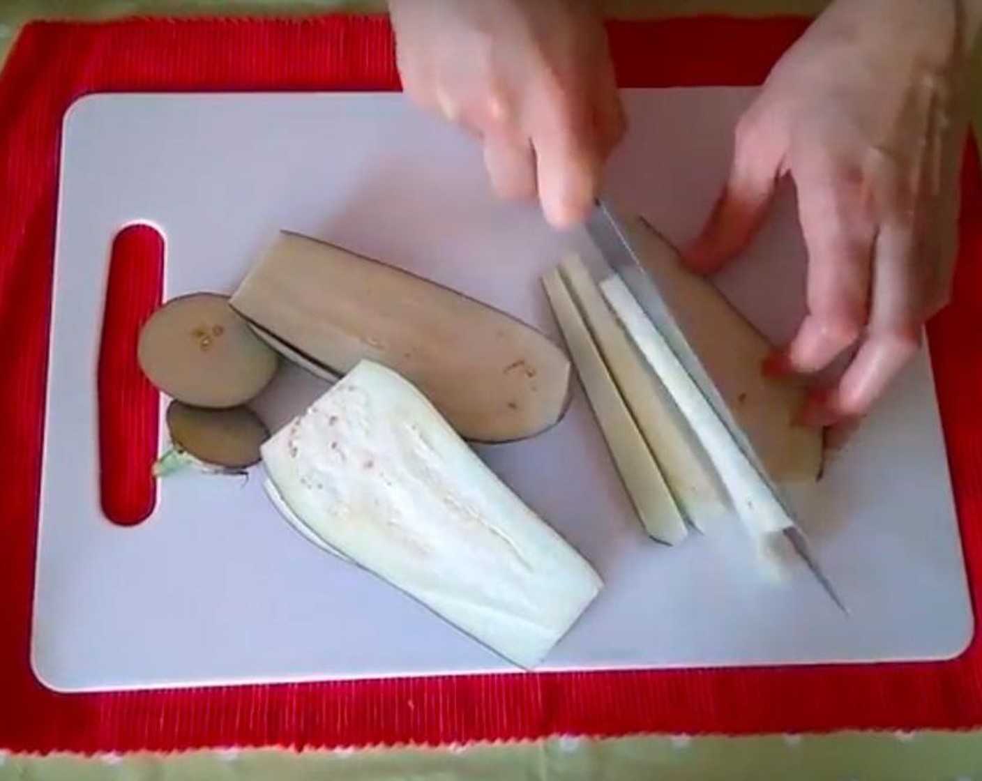 step 1 Slice the Eggplants (2) into strips.