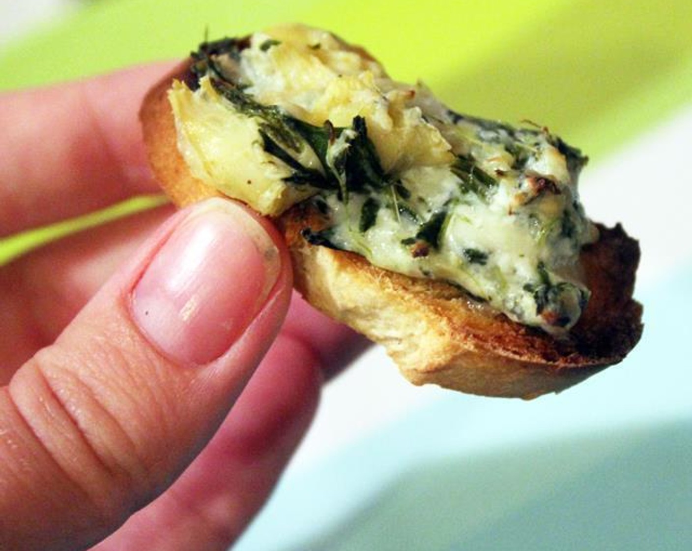 Spinach Artichoke Toasts