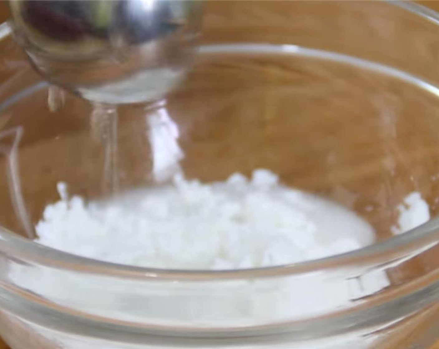 step 1 Add the Water (1 Tbsp) and Corn Starch (1 Tbsp) to a small bowl and mix until they are well combined.