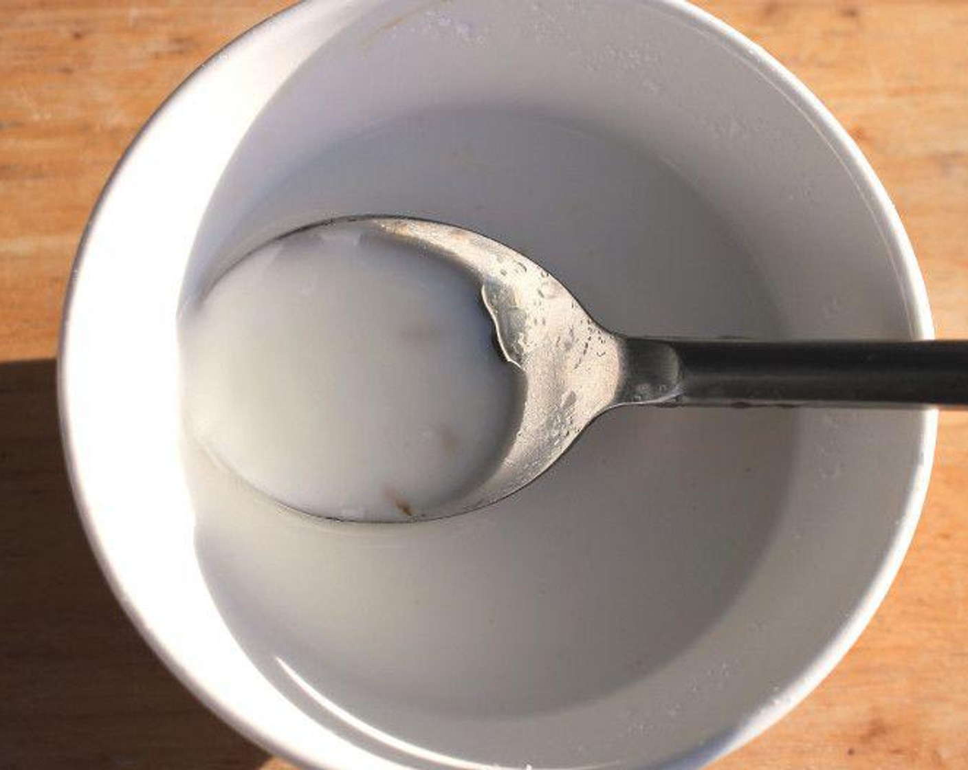 step 6 Prepare a cornstarch slurry by whisking Corn Starch (2 Tbsp) into Chicken Stock (3 Tbsp) in a small bowl until fully combined.