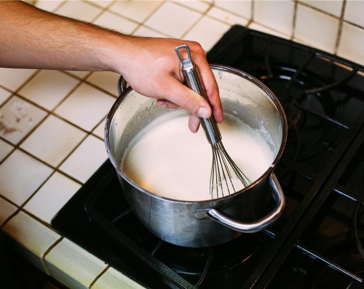 step 5 Continue stirring until mixture registers 165 to 180 degrees F (74 to 82 degrees C) on an instant-read thermometer, about 2 minutes. Do not heat above 180 degrees F (82 degrees C), or eggs in base will scramble.