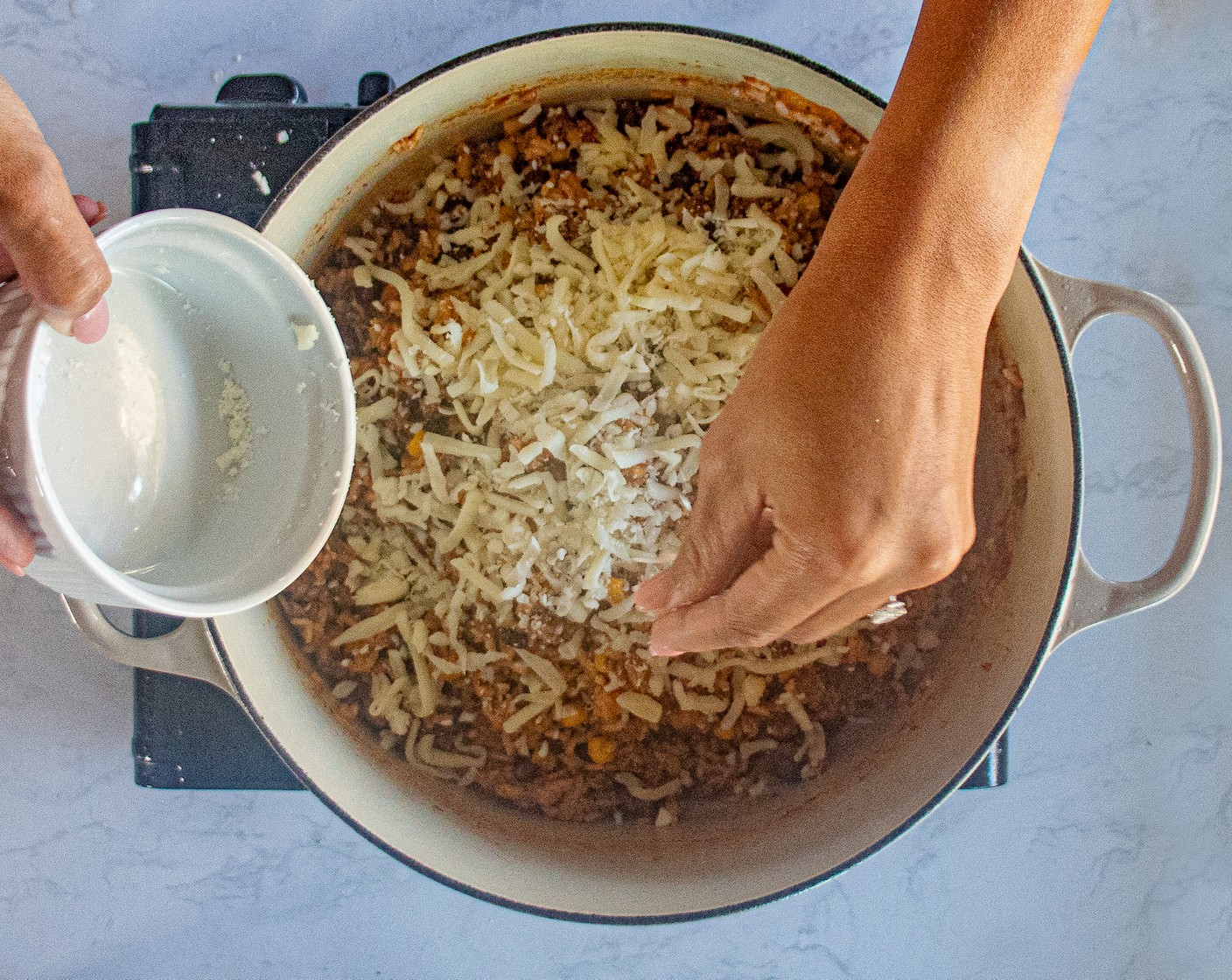 step 8 After 20-25 minutes, add the Scallion (1/4 cup) and Shredded Mozzarella Cheese (1 pckg). Stir in well.