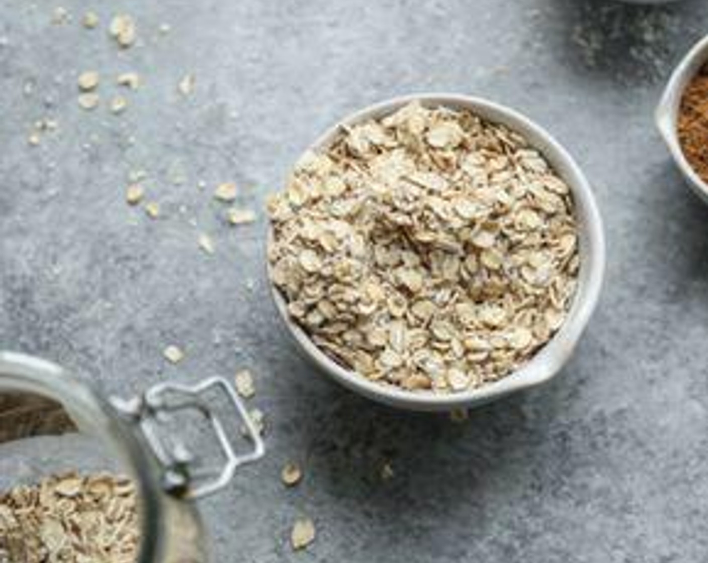 step 2 In a small food processor, add the Gluten-Free Rolled Oats (2 1/4 cups), Unsweetened Coconut Flakes (1/2 cup), and Sea Salt (to taste).  Pulse about seven or eight times, until the oats are broken down and coarsely ground. Transfer to a large bowl.