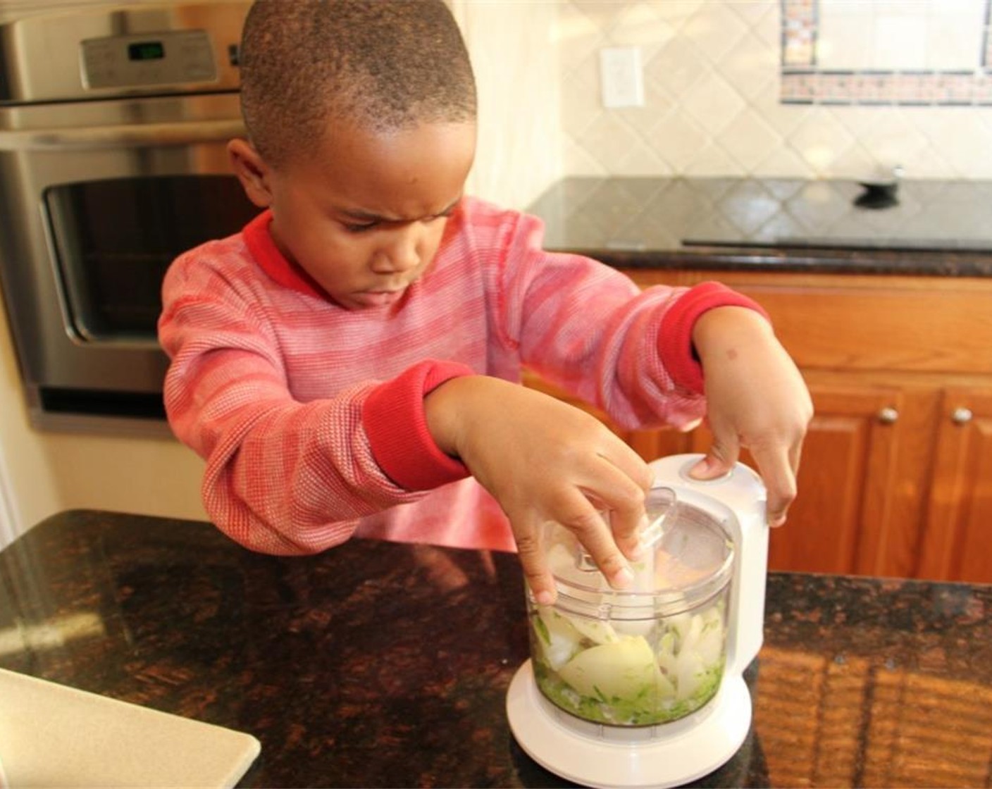 step 3 Take the chunks of veggies and place them in an electric chopper.