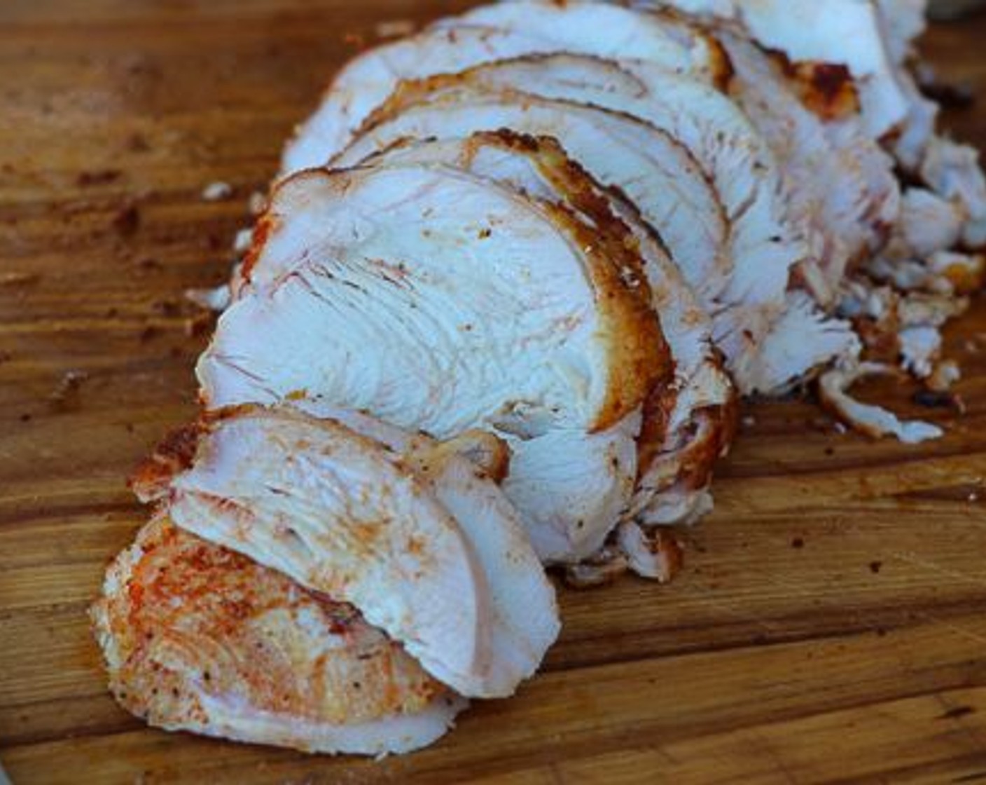 step 7 When the turkey breast reaches 165 degrees F (73 degrees C) remove it from the grill and rest for 15 minutes. Remove the netting from around the breast and cut into thin slices.