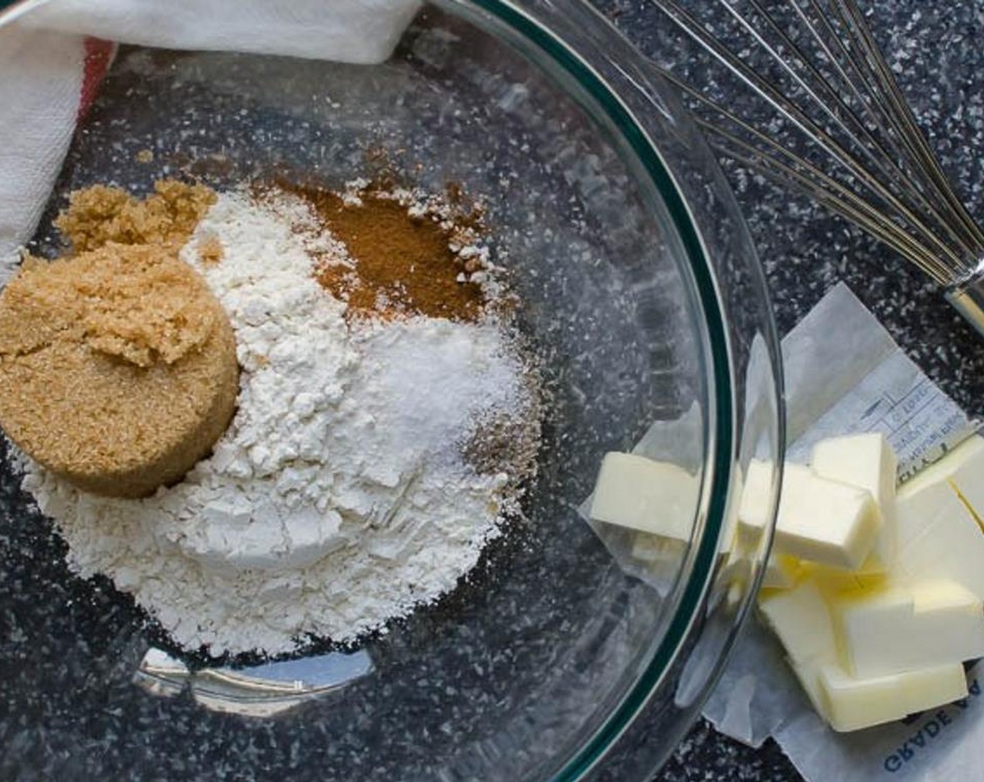 step 2 In a medium bowl combine the All-Purpose Flour (1/2 cup), Brown Sugar (1/4 cup), Ground Cinnamon (1/2 tsp), Ground Cardamom (1/4 tsp), Baking Powder (3/4 tsp), Unsalted Butter (1/4 cup), and Kosher Salt (1/4 tsp). Whisk to combine.