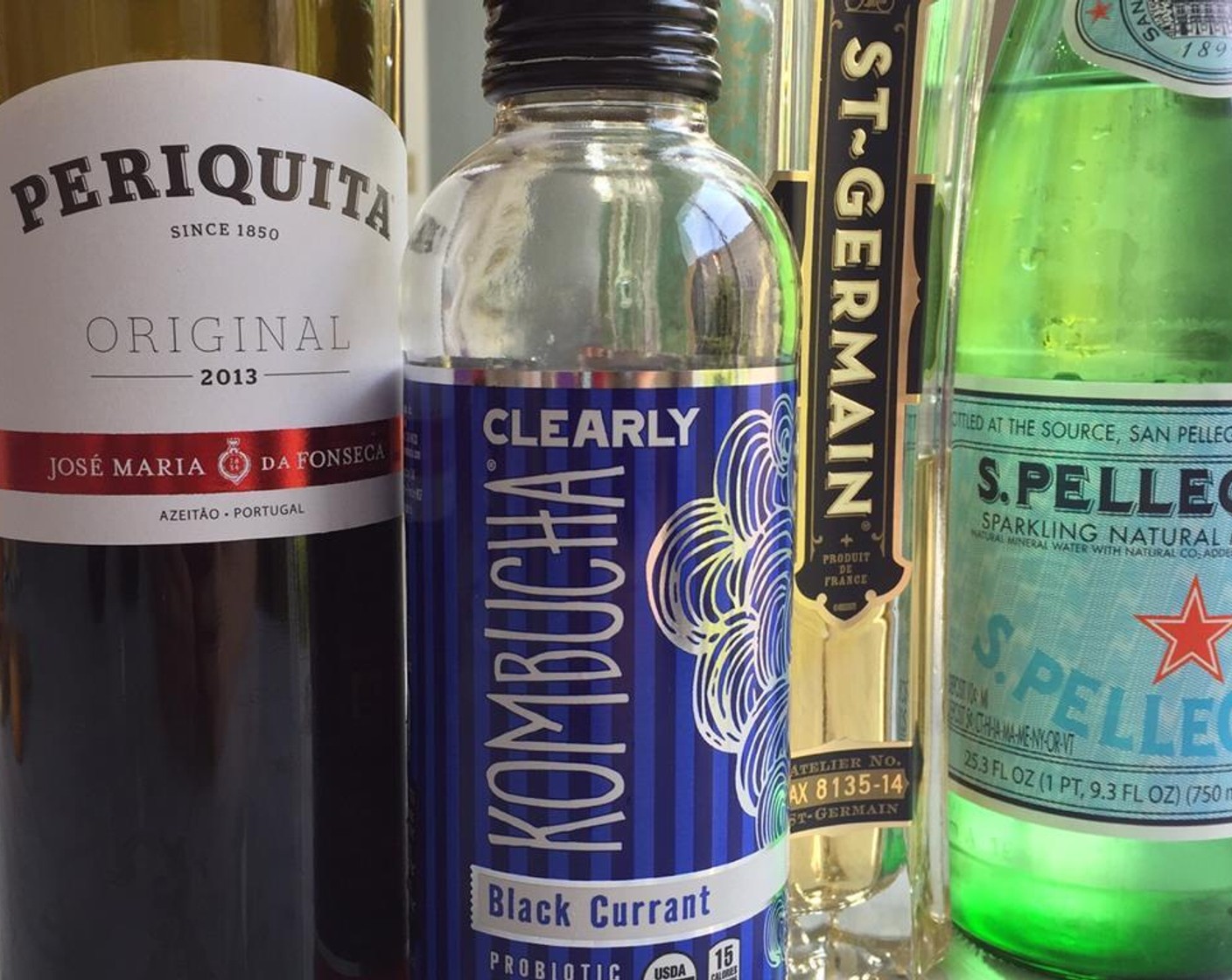 step 2 Divide the Fruity Red Wine (8 fl oz), Clearly Kombucha Black Currant (8 fl oz), and ST. GERMAIN (1 fl oz) between the glasses and stir.