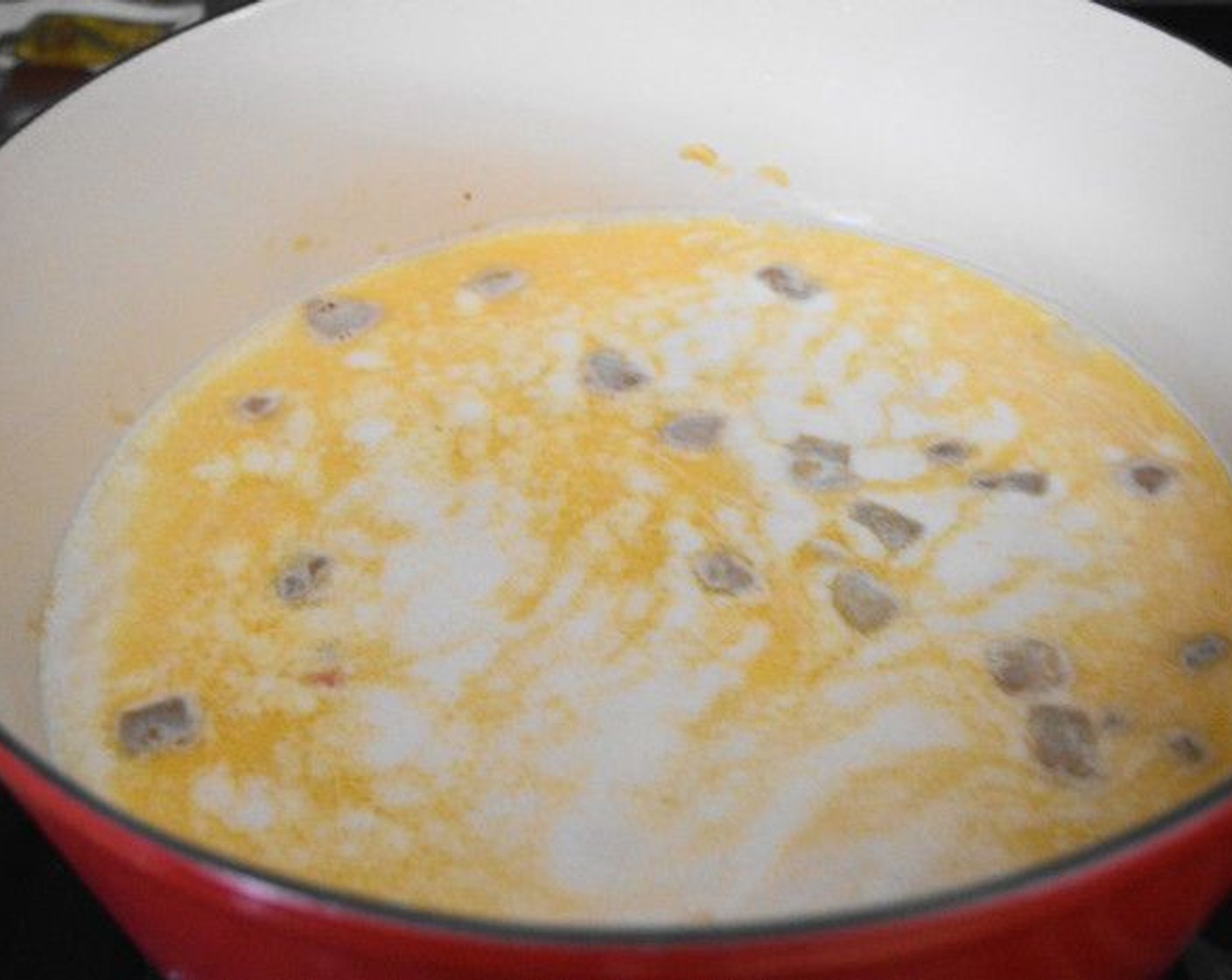 step 4 Pour in the Beer (1 bottle), Chicken Stock (4 cups), Heavy Cream (1 1/2 cups), and Salt (1 pinch) and give the soup base a big stir. Bring it to a gentle boil, then turn the heat to medium low and let it simmer for 20 minutes.