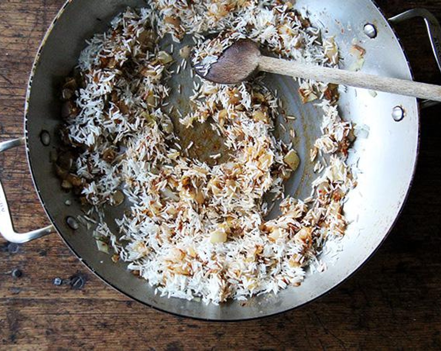 step 6 Add Basmati Rice (1 cup) and stir for another minute or until each grain is glistening.