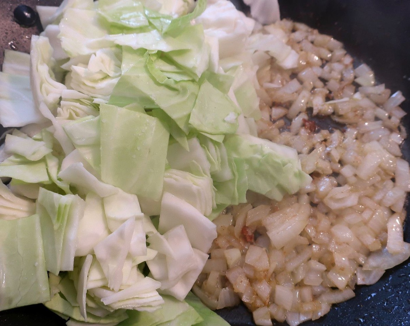 step 7 Add the Napa Cabbage (3 cups) and stir fry 1 minute.