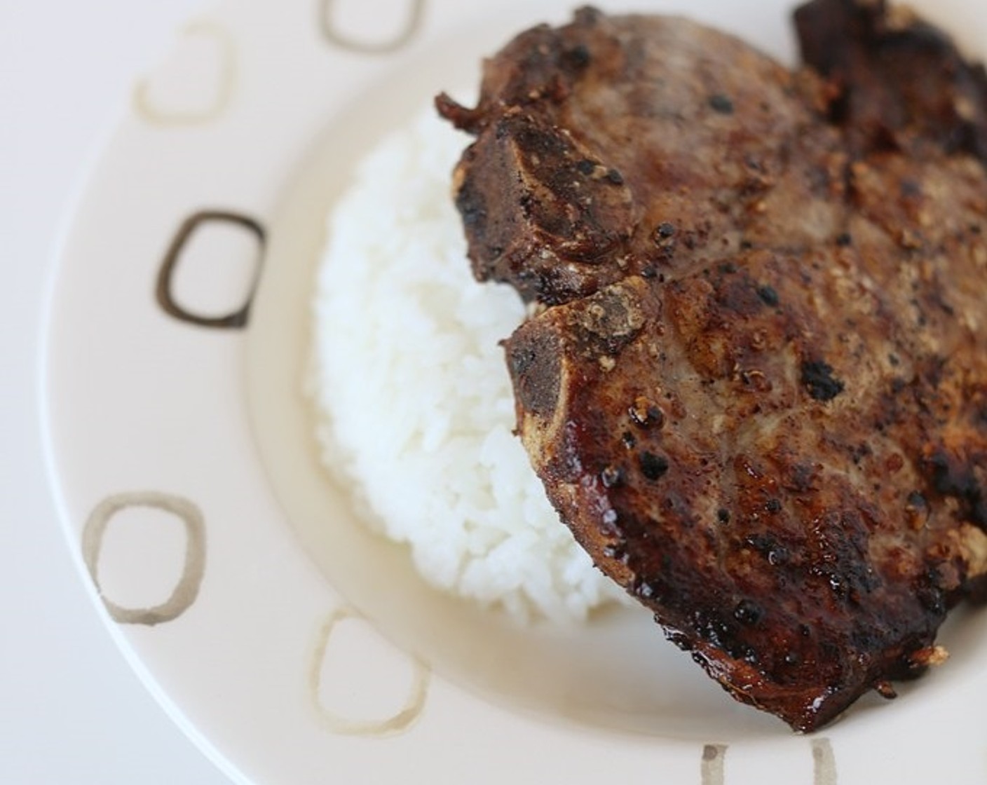 step 7 Carefully add chops to the skillet and cook through, turning once until golden brown on both sides.