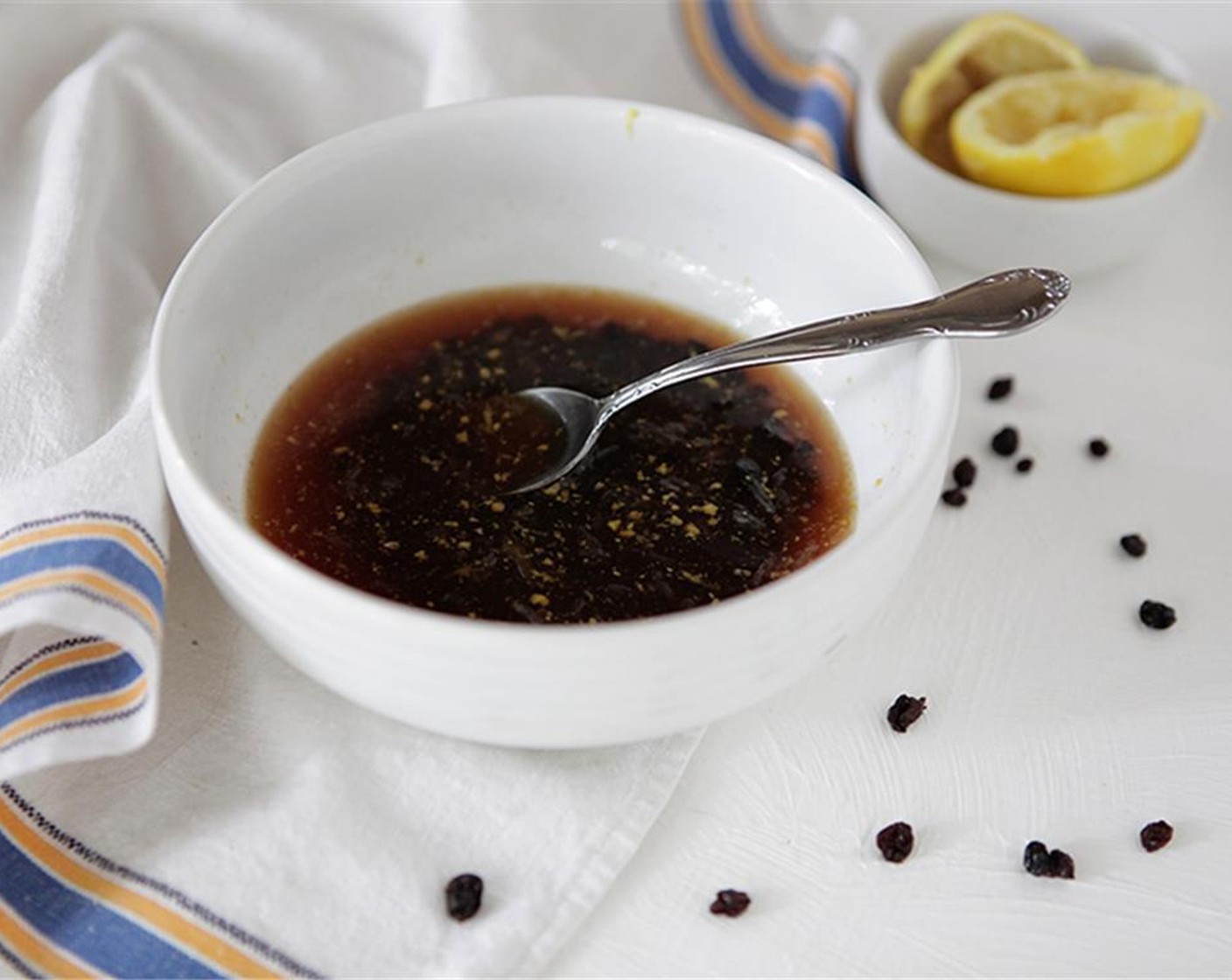 step 1 Combine the boiling Water (1 fl oz), Raw Sugar (1 1/2 Tbsp), Sherry Vinegar (1 fl oz), Lemons (2), and Dried Currants (4 Tbsp). Let stand for at least 10 minutes.