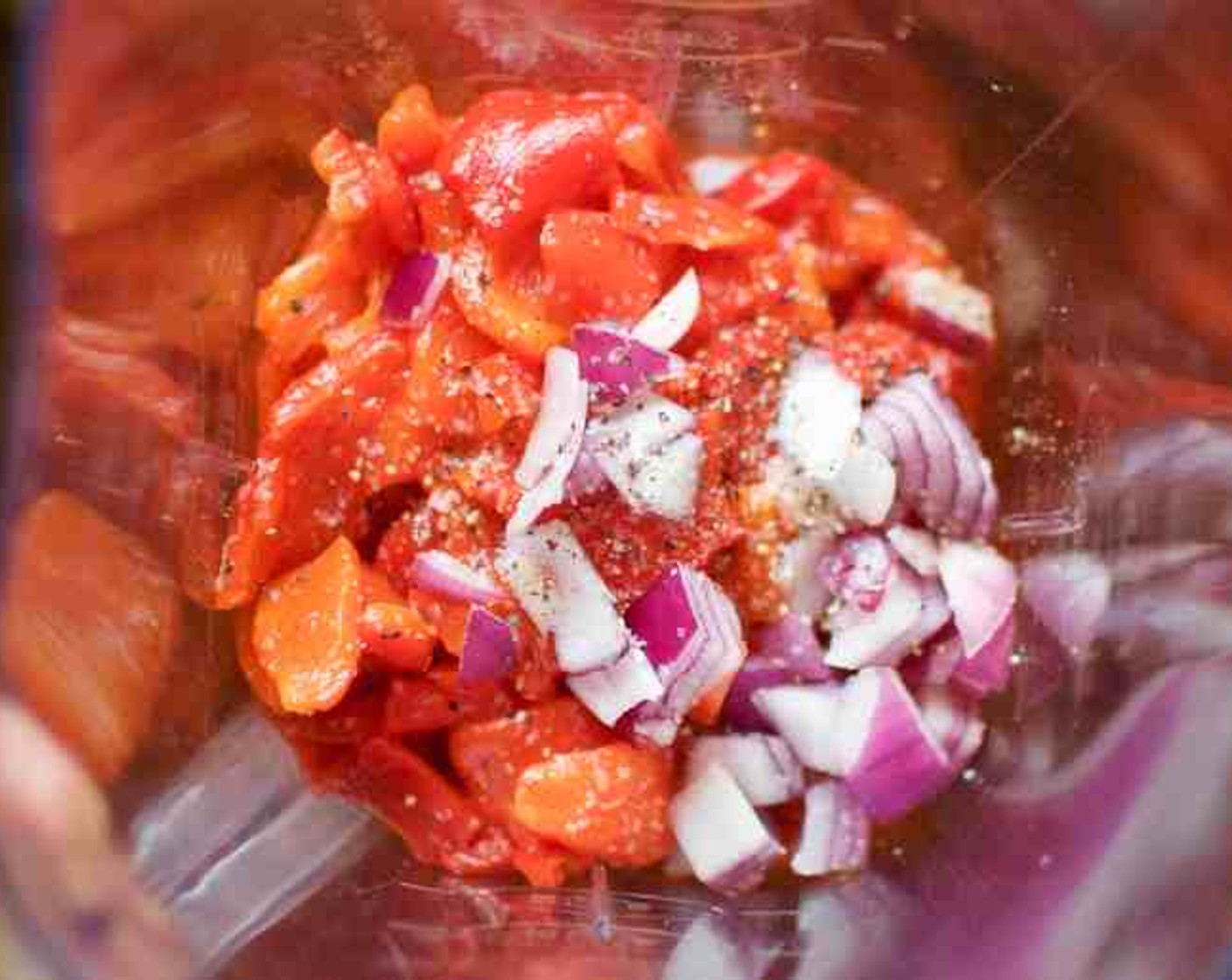 step 10 Combine the roasted garlic, roasted red peppers, Chipotle Chili Puree (1 Tbsp), Red Onion (1/2), Red Wine Vinegar (1/4 cup), Honey (1 Tbsp), and Dijon Mustard (1 Tbsp) in a blender. Season with salt and pepper. Blend until smooth.