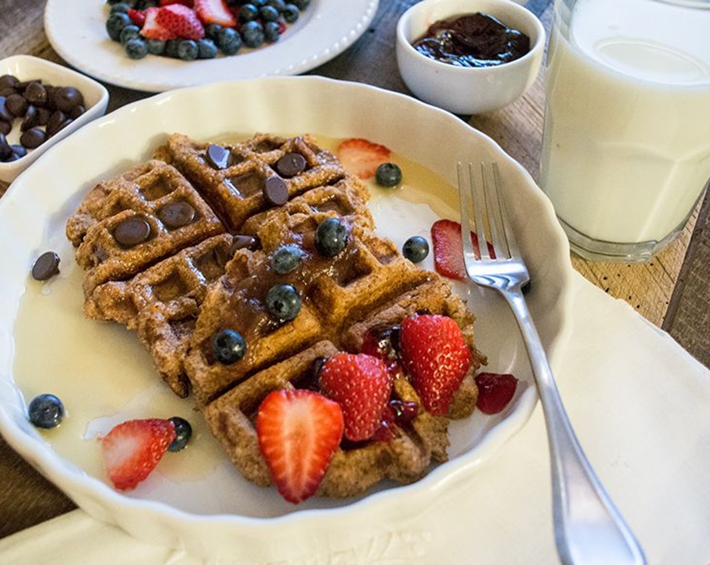 step 4 Plate the waffles and garnish with desired toppings, such as berries, maple syrup or chocolate chips!